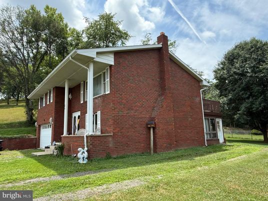 Attached, Exterior, Facade, Brick Facade, None