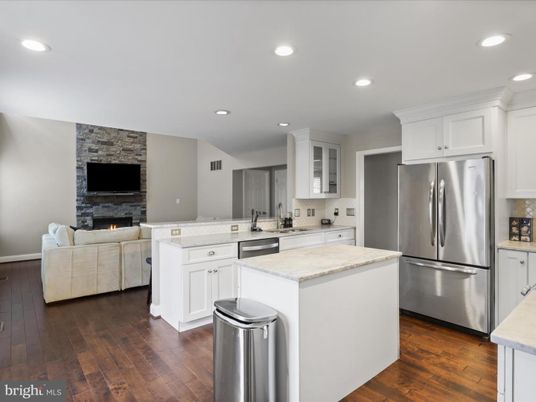 Fireplace, Interior, Kitchen, Living room, Recessed Lighting, Stainless Steel Appliances, Wood Texture Flooring