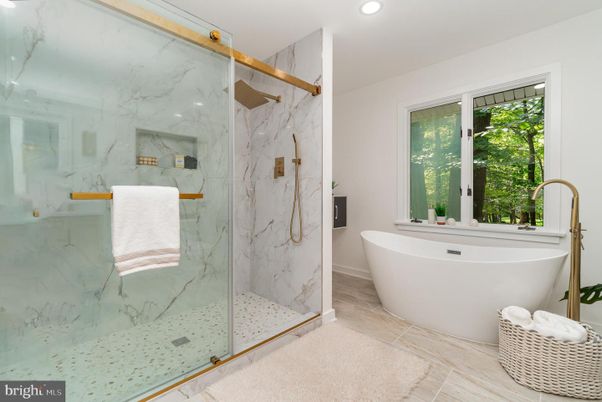 Bathroom, Free Standing Baths, Glass Shower, Interior, Marble Walls, Recessed Lighting