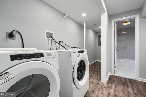 Interior, Marble, Marble Walls, Recessed Lighting, Washer, Wood Texture Flooring