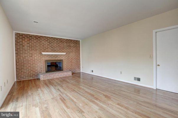 Empty room, Fireplace, Interior, Stone Walls, Wood Texture Flooring