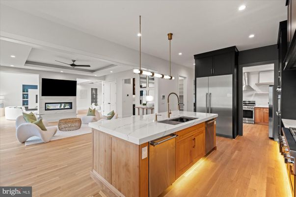 Fireplace, Interior, Kitchen, Living room, Pendant Lights, Recessed Lighting, Stainless Steel Appliances, Wood Texture Flooring