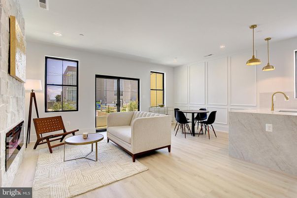 Dining room, Fireplace, Interior, Living room, Pendant Lights, Recessed Lighting, Wood Texture Flooring