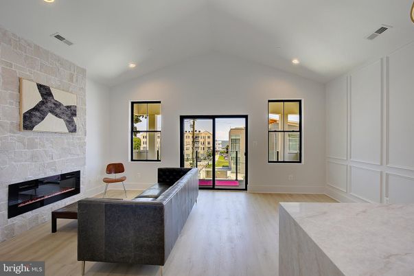 Fireplace, Interior, Recessed Lighting, Stone Walls, Wood Texture Flooring