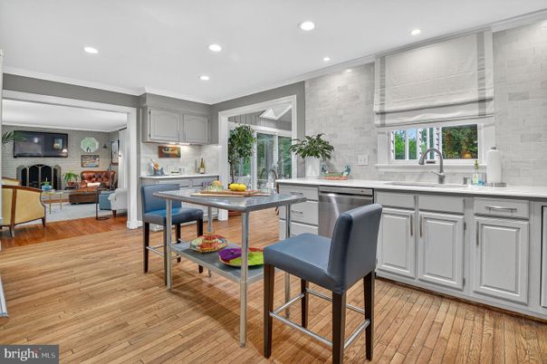Fireplace, Interior, Kitchen, Recessed Lighting, Stainless Steel Appliances, Stone Walls, Wood Texture Flooring