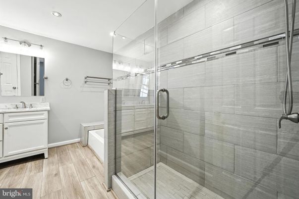Bathroom, Glass Shower, Interior, Recessed Lighting, Wood Texture Flooring
