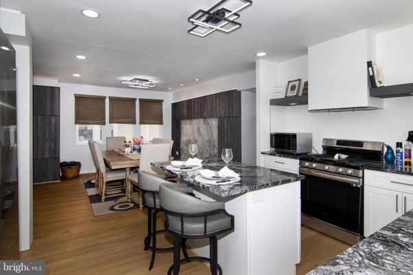 Dining room, Interior, Kitchen, Recessed Lighting, Stainless Steel Appliances, Wood Texture Flooring