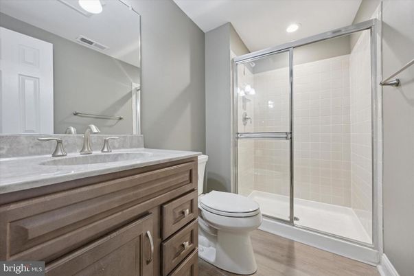 Bathroom, Glass Shower, Interior, Recessed Lighting, Wood Texture Flooring