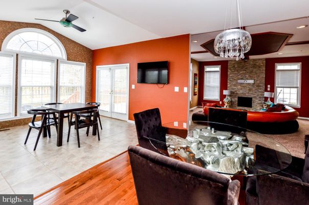 Dining room, Fireplace, Interior, Living room, Pendant Lights, Recessed Lighting, Stone Walls, Wood Texture Flooring