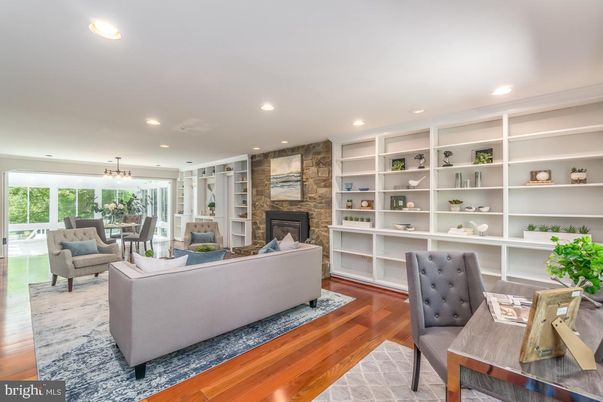 Chandelier, Dining room, Fireplace, Interior, Living room, Recessed Lighting, Stone Walls, Wood Texture Flooring