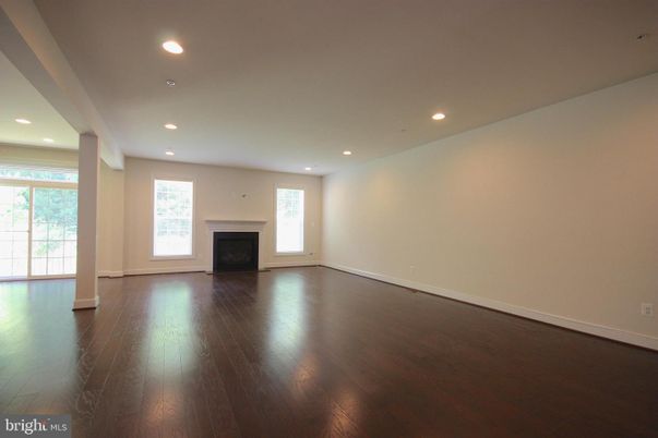 Empty room, Fireplace, Interior, Recessed Lighting, Wood Texture Flooring