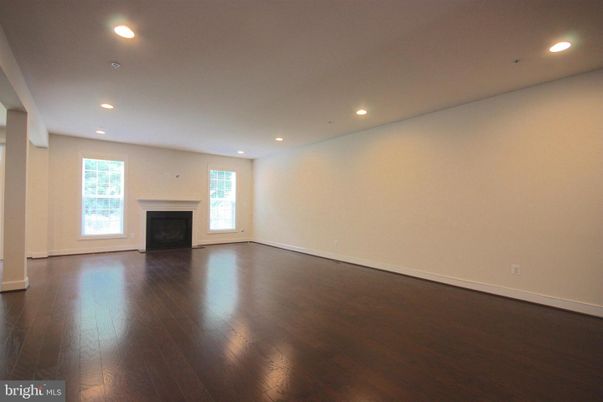 Empty room, Fireplace, Interior, Recessed Lighting, Wood Texture Flooring