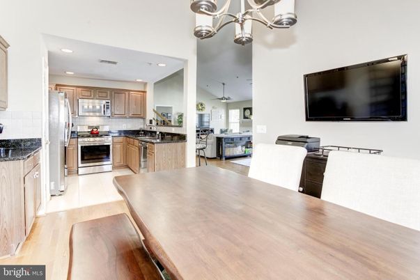 Dining room, Interior, Kitchen, Recessed Lighting, Stainless Steel Appliances, Wood Texture Flooring