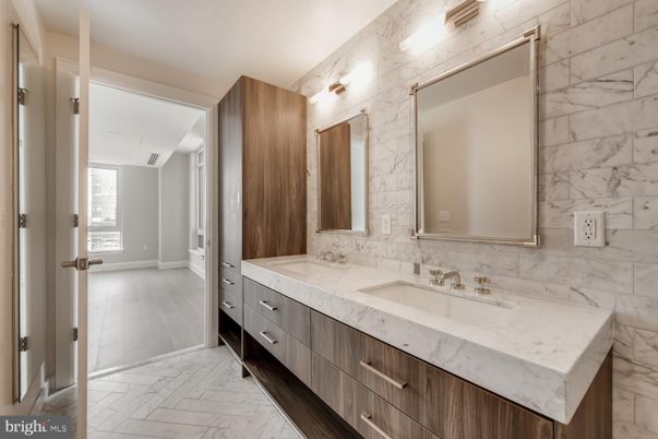 Bathroom, Dual Sink Vanities, Interior, Marble, Marble Walls, Wood Texture Flooring