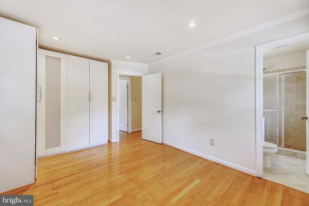 Bathroom, Empty room, Glass Shower, Interior, Recessed Lighting, Wood Texture Flooring