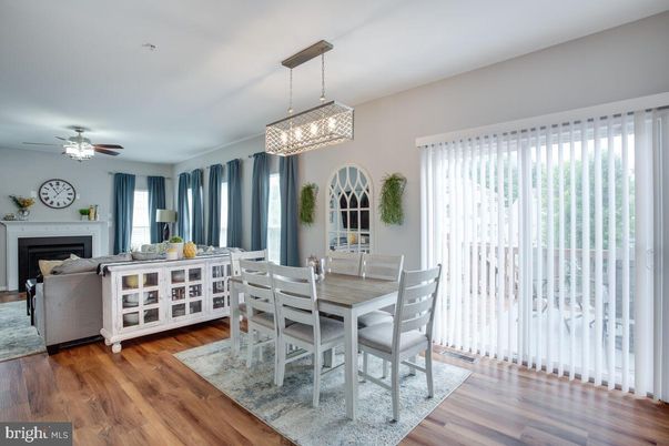 Dining room, Fireplace, Interior, Living room, Pendant Lights, Wood Texture Flooring