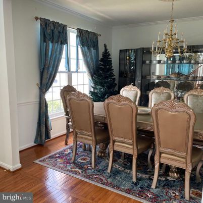 Chandelier, Dining room, Interior, Wood Texture Flooring