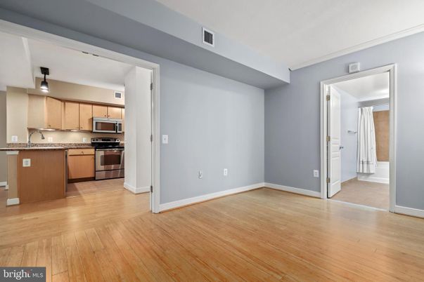 Empty room, Interior, Kitchen, Stainless Steel Appliances, Wood Texture Flooring