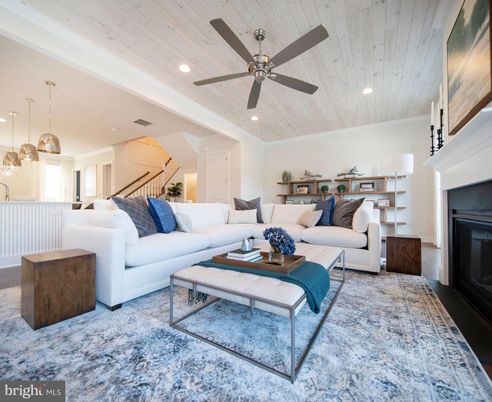 Fireplace, Interior, Living room, Pendant Lights, Recessed Lighting, Wooden Ceilings, Wood Texture Flooring