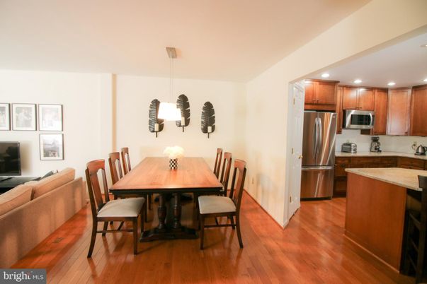 Dining room, Interior, Kitchen, Pendant Lights, Recessed Lighting, Stainless Steel Appliances, Wood Texture Flooring