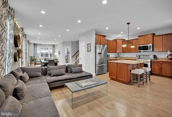 Dining room, Interior, Kitchen, Living room, Pendant Lights, Recessed Lighting, Stainless Steel Appliances, Wood Texture Flooring