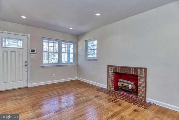 Empty room, Fireplace, Interior, Recessed Lighting, Wood Texture Flooring