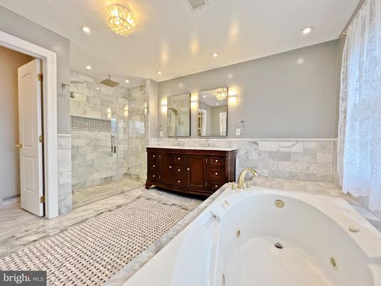 Bathroom, Dual Sink Vanities, Glass Shower, Interior, Marble Walls, Recessed Lighting