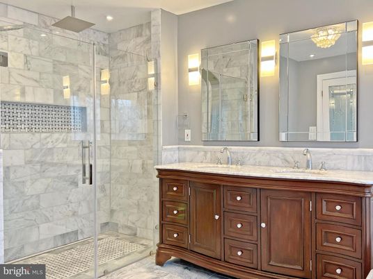 Bathroom, Dual Sink Vanities, Glass Shower, Interior, Marble Walls, Recessed Lighting