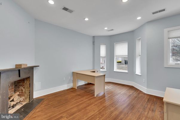 Fireplace, Game Room, Interior, Recessed Lighting, Wood Texture Flooring