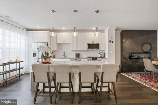 Fireplace, Interior, Kitchen, Pendant Lights, Recessed Lighting, Stainless Steel Appliances, Wood Texture Flooring