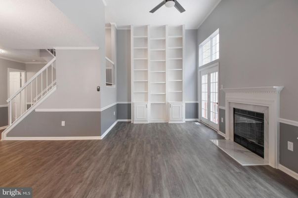 Empty room, Fireplace, Interior, Recessed Lighting, Wood Texture Flooring