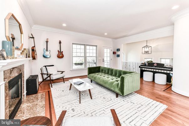 Dining room, Fireplace, Interior, Living room, Pendant Lights, Recessed Lighting, Wood Texture Flooring