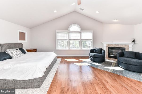 Bedroom, Fireplace, Interior, Recessed Lighting, Wood Texture Flooring