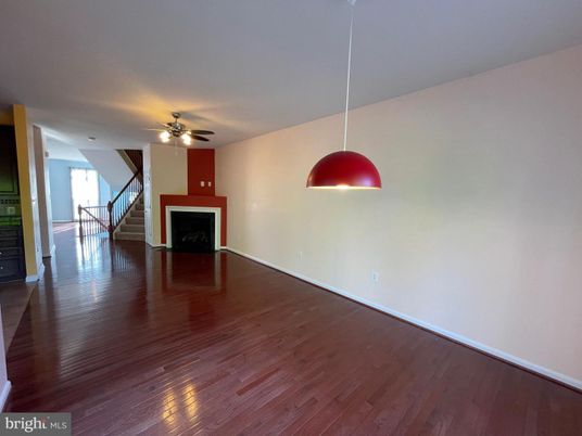 Empty room, Fireplace, Interior, Pendant Lights, Wood Texture Flooring