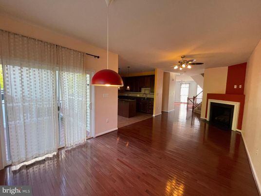 Empty room, Fireplace, Interior, Kitchen, Pendant Lights, Wood Texture Flooring