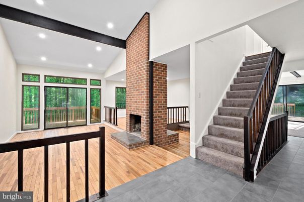 Fireplace, Interior, Recessed Lighting, Stone Walls, Wood Texture Flooring