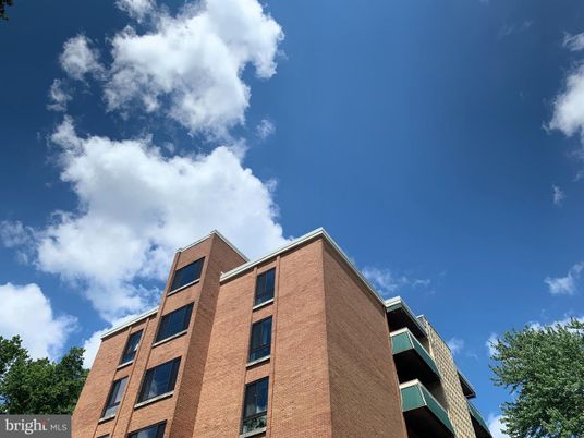 Exterior, Facade, Brick Facade, Condo Building