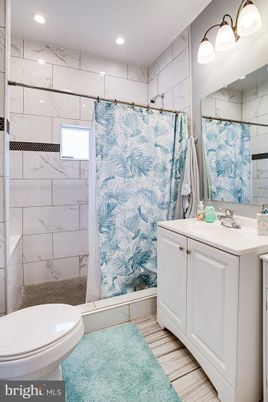 Bathroom, Interior, Marble Walls, Recessed Lighting, Wood Texture Flooring