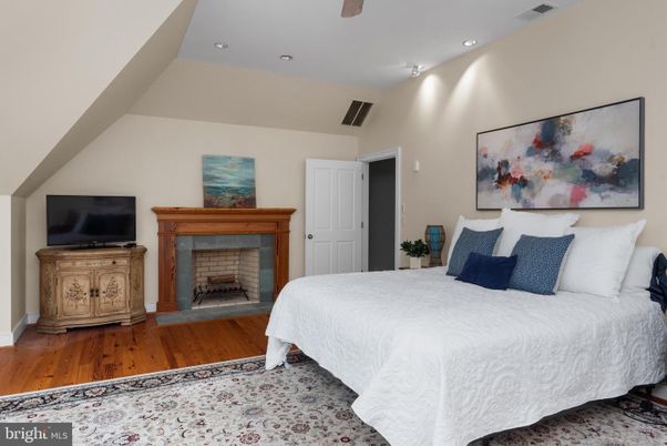 Bedroom, Fireplace, Interior, Recessed Lighting, Wood Texture Flooring