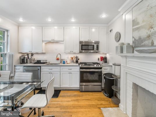 Dining room, Interior, Kitchen, Recessed Lighting, Stainless Steel Appliances, Wood Texture Flooring