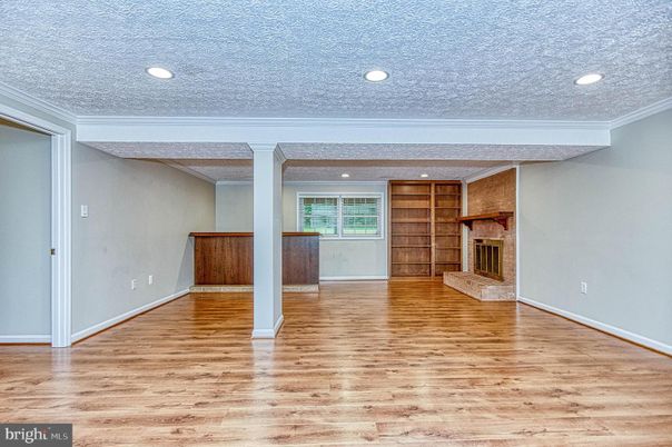 Empty room, Fireplace, Interior, Recessed Lighting, Wood Texture Flooring