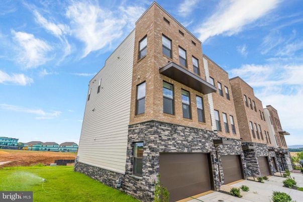Attached, Exterior, Facade, Brick Facade, Rowhouse