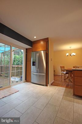 Chandelier, Dining room, Interior, Kitchen, Recessed Lighting, Stainless Steel Appliances, Wood Texture Flooring