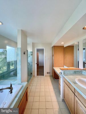 Bathroom, Dual Sink Vanities, Glass Shower, Interior, Recessed Lighting, Tile Countertops