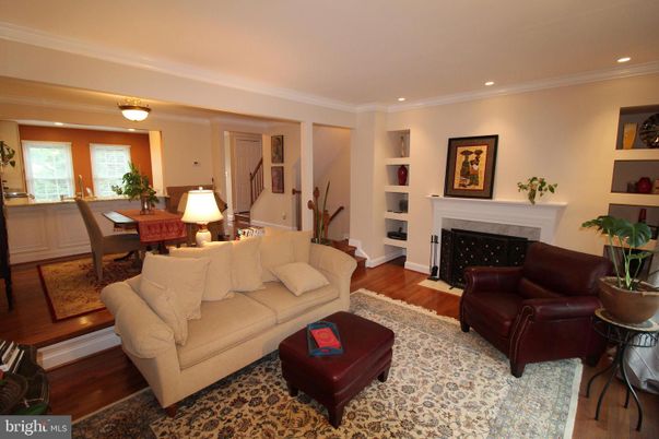 Dining room, Fireplace, Interior, Living room, Recessed Lighting, Wood Texture Flooring