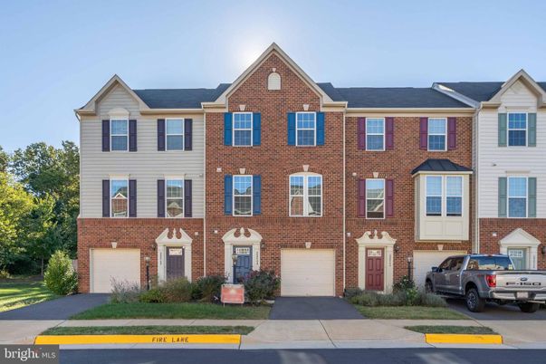 Attached, Exterior, Facade, Brick Facade, Rowhouse