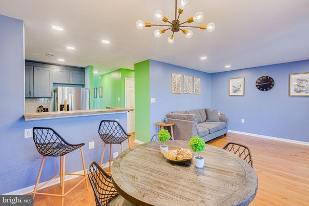 Dining room, Interior, Kitchen, Pendant Lights, Recessed Lighting, Stainless Steel Appliances, Wood Texture Flooring