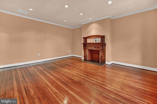 Empty room, Fireplace, Interior, Piano, Recessed Lighting, Wood Texture Flooring