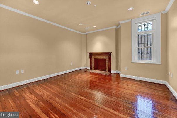 Empty room, Fireplace, Interior, Recessed Lighting, Wood Texture Flooring