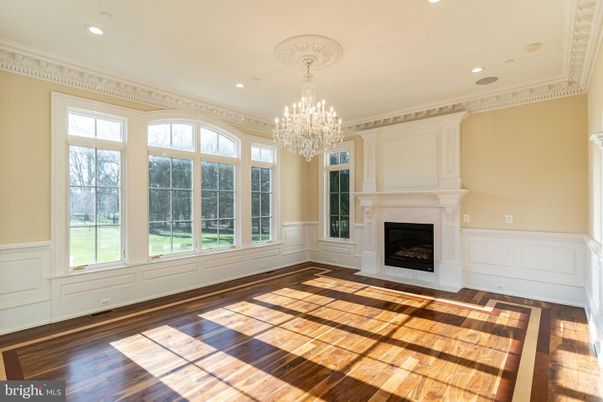 Chandelier, Empty room, Fireplace, Interior, Recessed Lighting, Wood Texture Flooring
